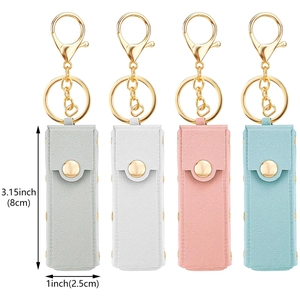 Detail showing 4 colors of PU leather lipstick keychains with size dimensions and gold clips