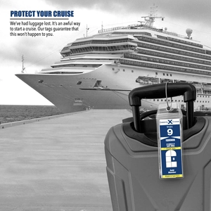 Waterproof clear PVC cruise luggage tag with metal eyelet shown on suitcase handle