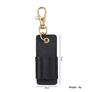Detail showing dimensions of compact black leather pen holder with golden lobster clasp