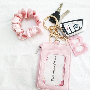 Pink leather card holder with matching scrunchie and marble letter B keychain accessory
