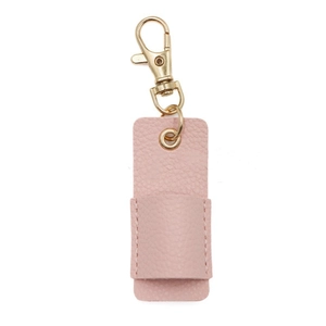 Close-up of pink litchi grain leather pen holder with a golden metal lobster clasp