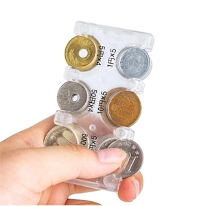 Portable clear plastic coin organizer with specific slots for Japanese yen coins