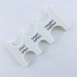 Macro detail of compact white coin organizer with 6 slots for Japanese Yen denominations
