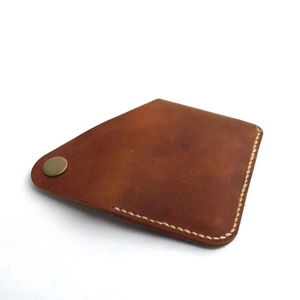 Handmade brown crazy horse leather wallet with snap closure and vintage stitch detailing
