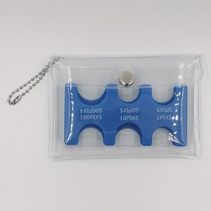 Close-up of clear PVC coin purse with blue organizer tray for Japanese Yen coins