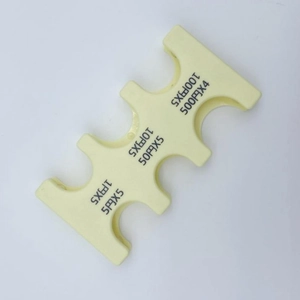 Detailed view of yellow plastic coin holder organizer for sorting Japanese yen coins