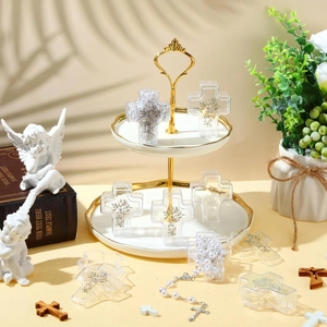 Clear cross-shaped plastic gift boxes for religious favors with pearl beads detail