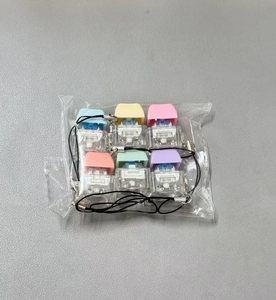 Set of 6 colorful mechanical keyboard fidget toys with transparent switches and lanyards