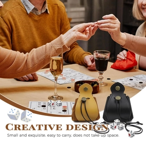 Brown and black leather dice bags with drawstring closure and metal snaps shown in use