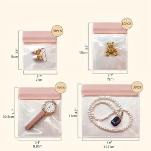 Pochettes bijoux épaisses en EVA en quatre tailles avec fermeture rose pour bijoux