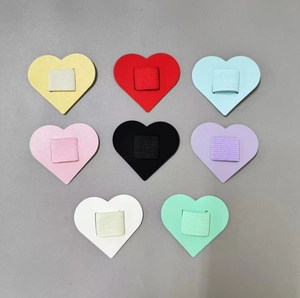 Set of eight colorful heart-shaped self-adhesive pen holders made of PU leather and elastic