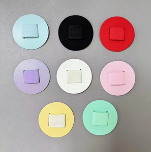 Detailed view of eight colorful PU leather self-adhesive pen holders for notebooks