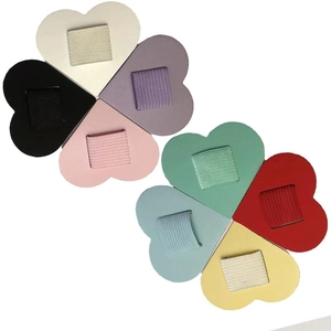 Set of eight heart-shaped PU leather elastic pen holders in various vibrant colors