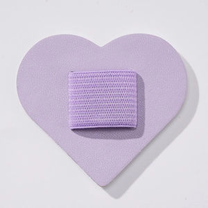 Detail view of purple PU leather heart pen holder with elastic loop for notebooks