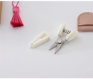 Mini high precision stainless steel thread scissors with white spring handle and red tassel