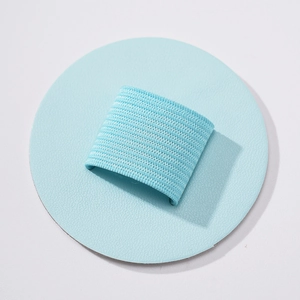 Detail of light blue PU leather self-adhesive pen holder with elastic loop for notebook