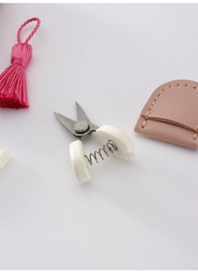 Mini high precision U-shaped scissors with pink leather sheath and tassel charm