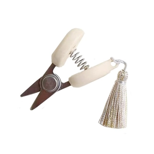 Mini high precision ivory scissors with stainless steel blade and silver tassel charm
