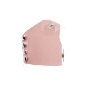 Detail of pink faux leather and PVC makeup wrist palette with silver metal rivets
