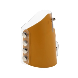 Detailed view of yellow and transparent PVC makeup artist glove with silver snap buttons