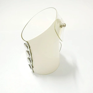 Detail showing white leather makeup artist glove with PVC overlay and silver snap fasteners