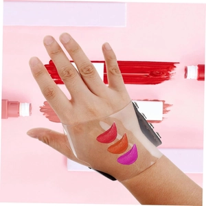 Professional clear PVC makeup hand palette for blending cosmetics on pink background