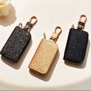 Glitter leather car key holders with gold carabiners in gold, black-gold, and silver finish