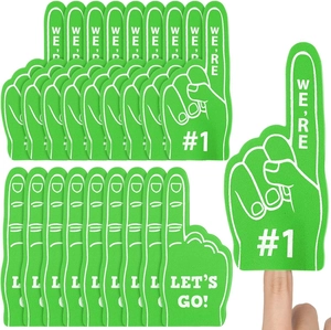 Close-up of green foam fingers with We're #1 text for sports events and cheering