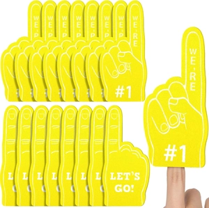 Macro shot of yellow EVA foam fingers with WE'RE #1 and LET'S GO slogans for cheering