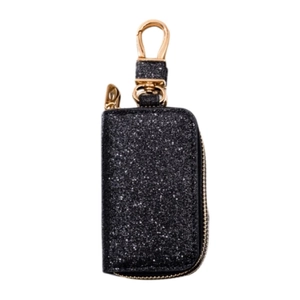 Detail of black glitter car key case with gold zipper and swivel snap hook