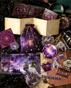 Macro detail of vintage magic themed stationery set with velvet bag and stickers