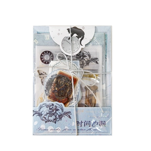 Vintage DIY scrapbook paper kit with retro stickers and blue butterfly motifs