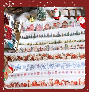 Detailopname van 8 kerst washi tapes met sneeuwtaferelen, Kerstmannen en bloemmotieven