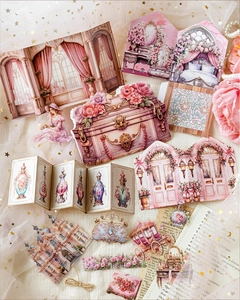 Detailed flat lay of vintage Victorian scrapbooking stickers with floral and palace motifs