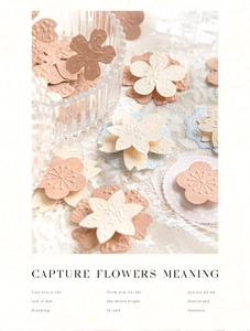 Detail of embossed floral paper stickers with vintage textures for DIY scrapbooking