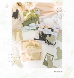 Detailed view of vintage romantic scrapbooking stickers with elegant embossed paper textures