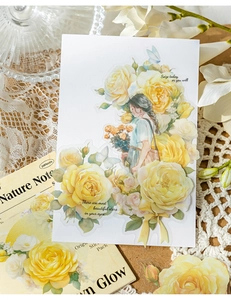 Detail of vintage PET floral stickers with roses and butterfly motifs for journaling