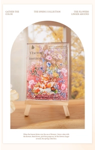 Detailed close-up of acrylic quicksand ornament with fox illustration and red glitter flow