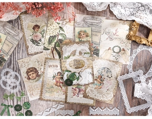 Vintage DIY scrapbooking kit with Victorian floral cards, lace, and green wax seals