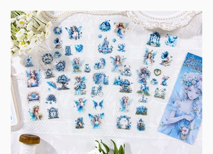 Detailed spread of blue fantasy fairy stickers with butterfly and castle motifs