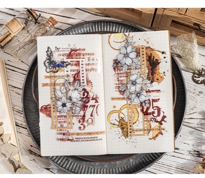 Detailed view of vintage PET stickers with butterfly and floral motifs on a notebook