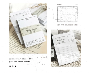 Macro detail of vintage stationery notepad with Daily Essays and Wish List functional pages