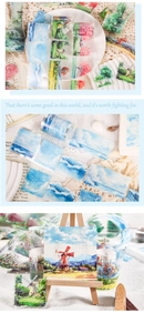 Detailed view of hand-painted nature landscape decorative tape for scrapbooking on easel