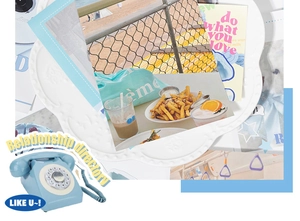 Artistic collage of vintage aesthetic cards and stickers on a white wave-edge tray