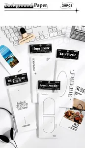 Detail view of vintage aesthetic paper set for scrapbooking with various typography themes