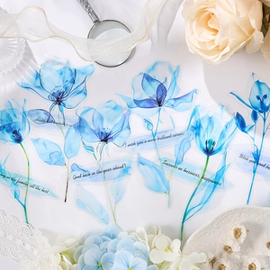 Pegatinas de flores PET azul con texto dorado y accesorios vintage en fondo blanco
