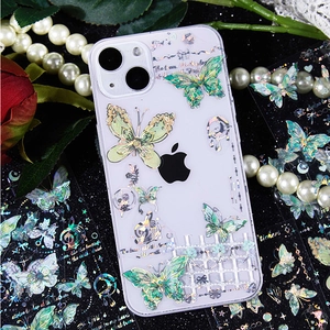 Transparant iPhone hoesje met gouden vlinder stickers en elegante bloemenpatronen