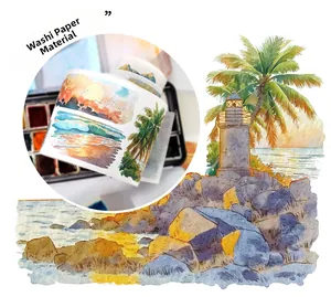 Detail of artistic watercolor ocean landscape washi tape with beach and sunset patterns