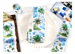 Detail of tropical seaside washi tape featuring coconut trees and blue ocean waves