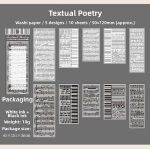 Macro detail of music-themed washi stickers featuring piano keys and poetic verses